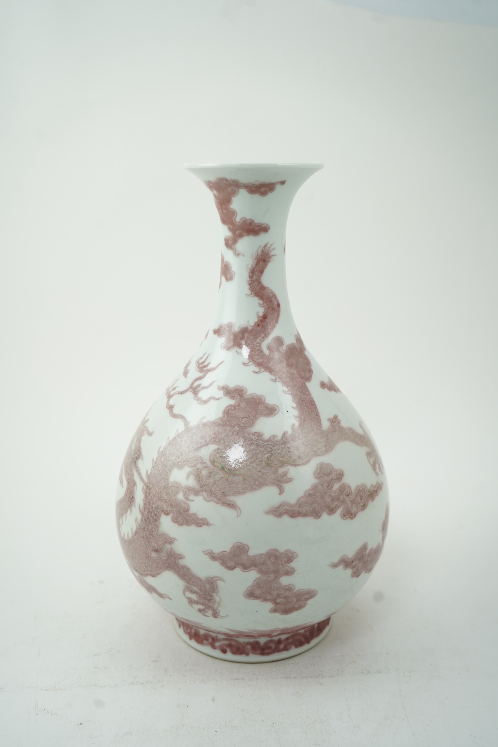 A Chinese underglaze copper-red ‘dragon’ bottle vase, yuhuchunping